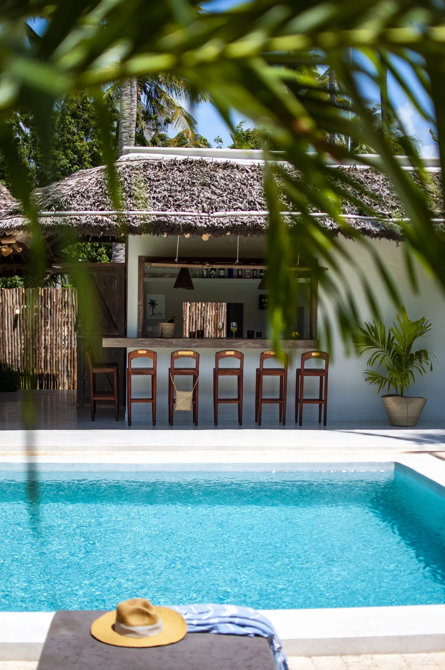 Pool bar through the palms at Watamu Dunes
